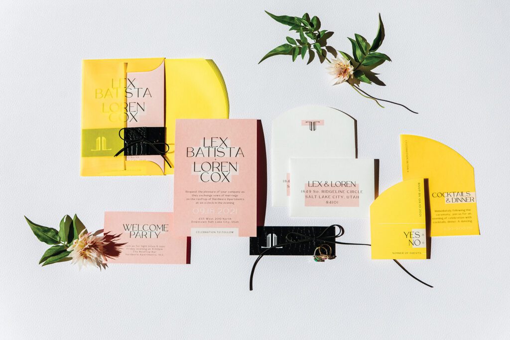 Yellow and pink invitations by Twelve30 Creative. Photo by Michael Cozzens.