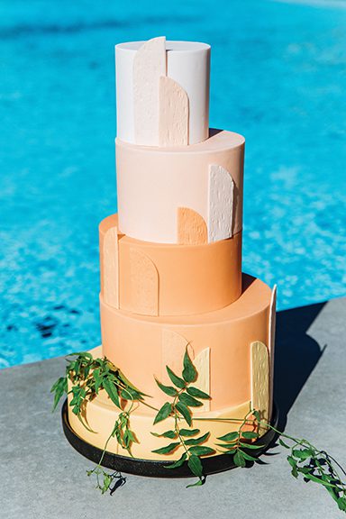Tiered cake by Flour & Flourish. Photo by Michael Cozzens.